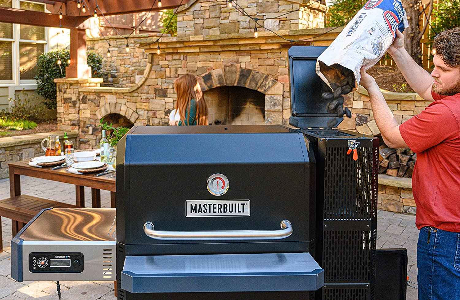 image of the Masterbuilt Gravity Series 1050 Digital Charcoal Grill & Smoker MB20041220 Charcoal hopper